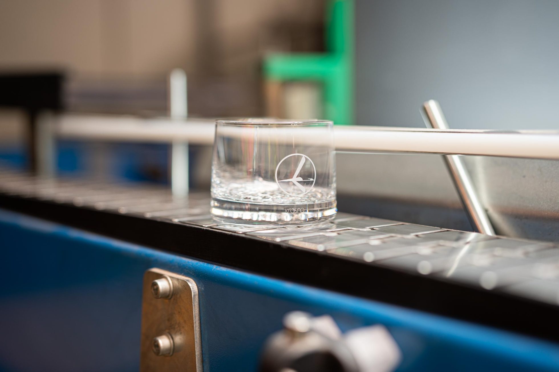 Glass with crane logo in cooperation with Krosno brand